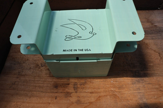 Nano 4 soil blocker in green with the stamped swallow logo and Made in the USA mark