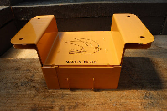 Nano 9 soil blocker in tangerine with the stamped swallow logo and Made in the USA mark