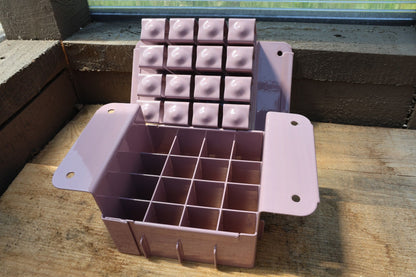 Lavender Nano 16 open, showing sixteen cells for 1.125 inch soil blocks