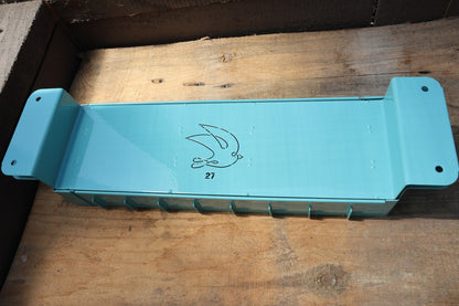 Swift Blocker Mini 27 soil blocker in teal with the stamped swallow logo