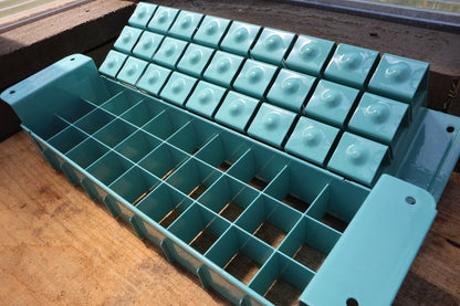Angled view of the Swift Blocker Mini 27 showing block depth and cell dividers