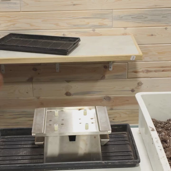 The Dahlia Blocker demo — fill, flip, and push out a full tray of blocks