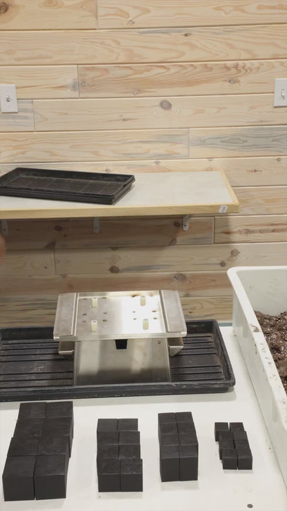 The Dahlia Blocker demo — fill, flip, and push out a full tray of blocks